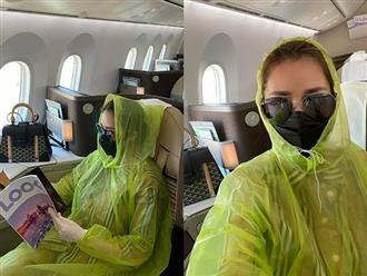 Phòng dịch Covid-19, Quế Vân mặc áo mưa phủ 'kín người' khi đi máy bay