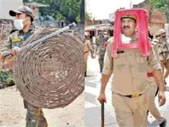 Không có đồ bảo hộ, cảnh sát Ấn Độ phải đội ghế nhựa lên đầu trong khi làm nhiệm vụ và cái kết đầy sửng sốt 