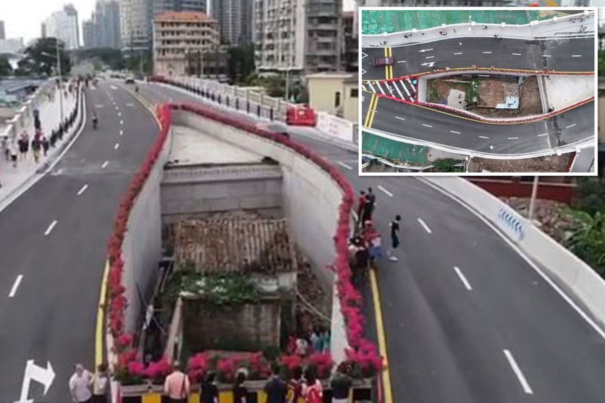 Dân không chịu giải tỏa, thành phố Trung Quốc bèn cho xây cầu bao quanh nhà - Ảnh 1